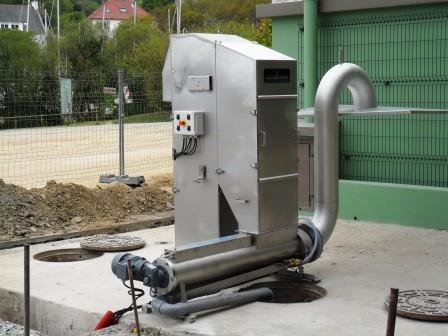 Un ensemble dégrilleur/compacteur