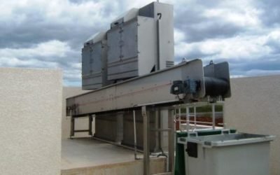 Un ensemble dégrilleur/convoyeur